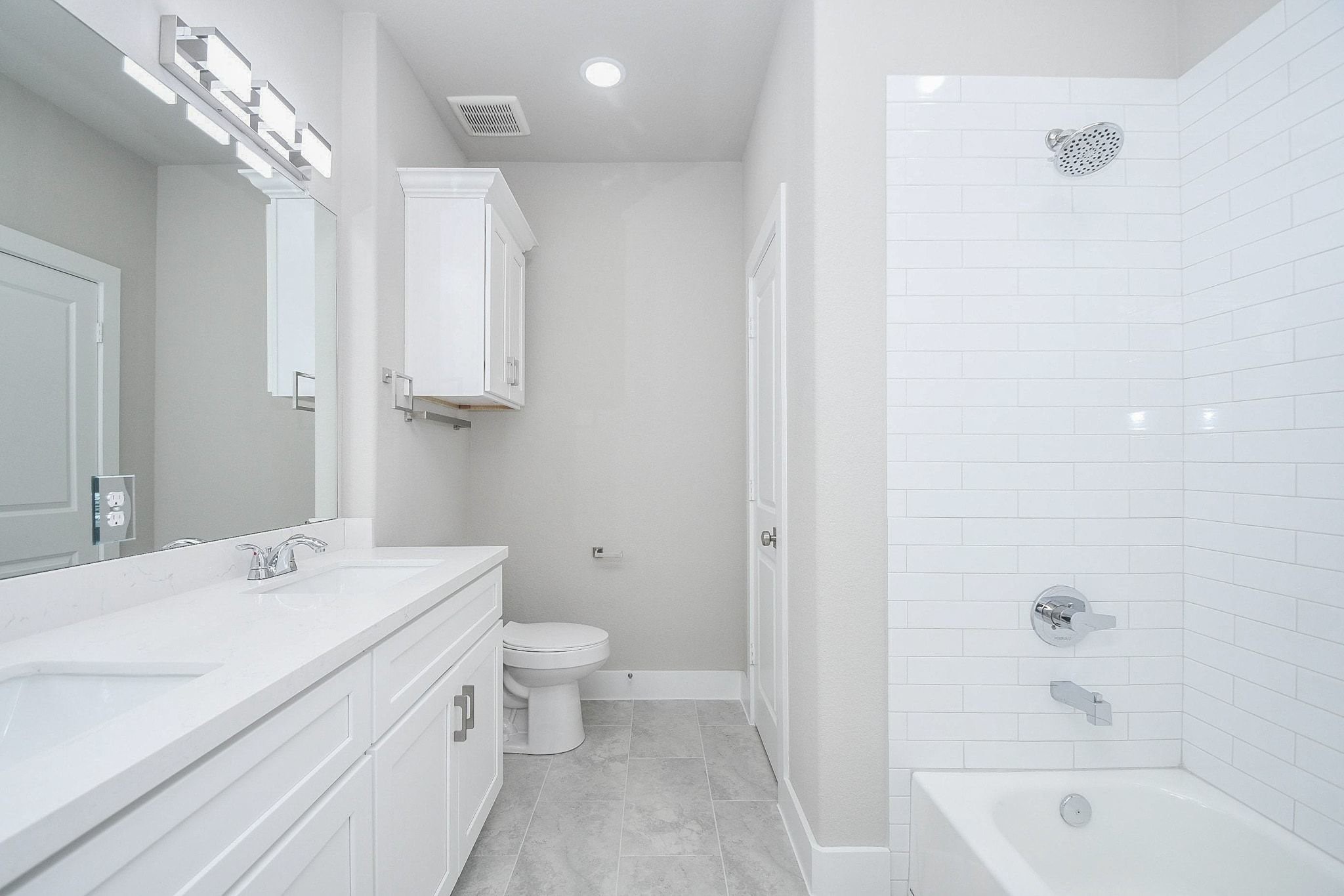 4401 Alvin Street, Unit A Houston, TX 77051 - Photo 13 of 19 a bathroom with a sink a toilet and shower