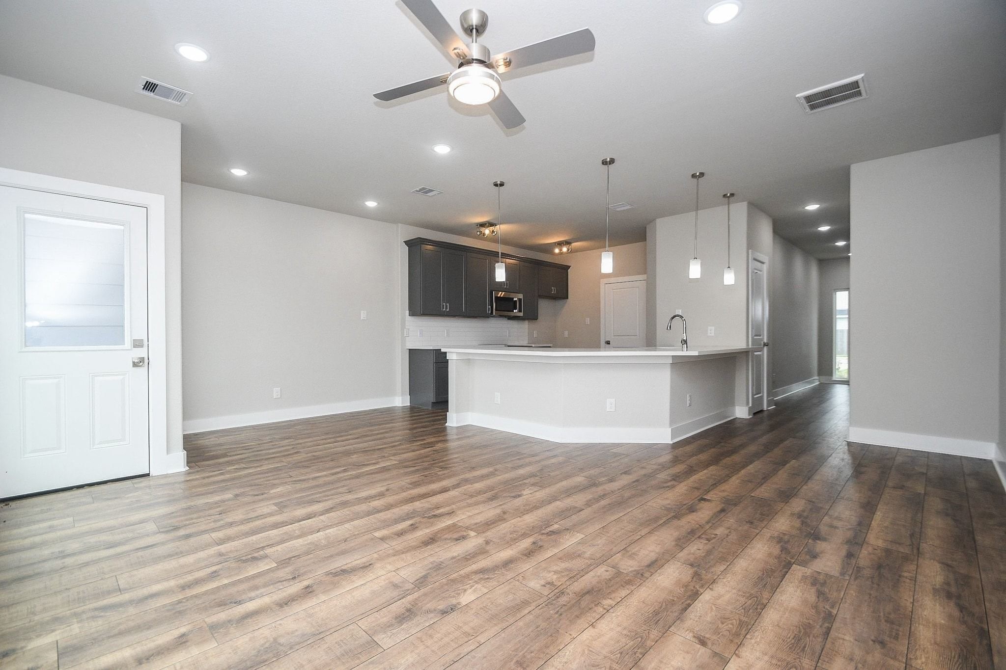 4401 Alvin Street, Unit A Houston, TX 77051 - Photo 5 of 19 a view of kitchen with kitchen island stainless steel appliances refrigerator oven and cabinets