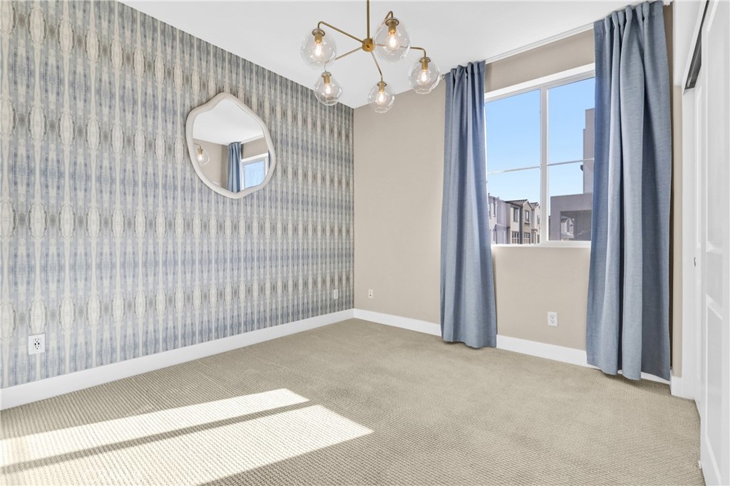 31861 Williams Way Rancho Mission Viejo, CA 92694 - Photo 13 of 28 a view of a livingroom with wooden floor and chandelier