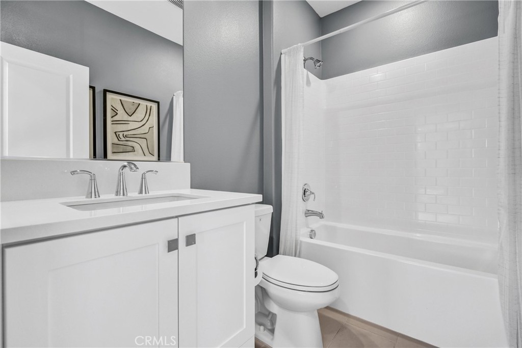 31861 Williams Way Rancho Mission Viejo, CA 92694 - Photo 15 of 28 a bathroom with a granite countertop sink toilet and shower