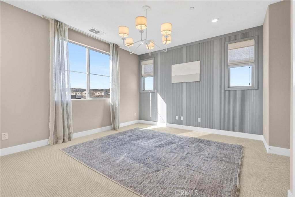31861 Williams Way Rancho Mission Viejo, CA 92694 - Photo 18 of 28 an empty room with windows and chandelier
