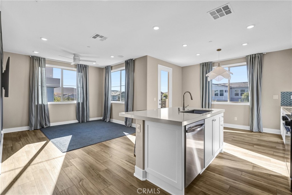 31861 Williams Way Rancho Mission Viejo, CA 92694 - Photo 5 of 28 a living room with stainless steel appliances granite countertop furniture wooden floor and a window