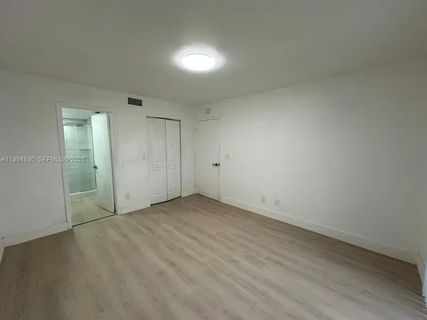 an empty room with an entryway