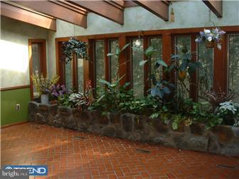 126 Heritage Road Haddonfield, NJ 08033 - Photo 8 of 8 a couple of potted plants in front of door
