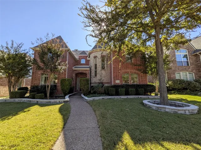 a house with swimming pool in front of it