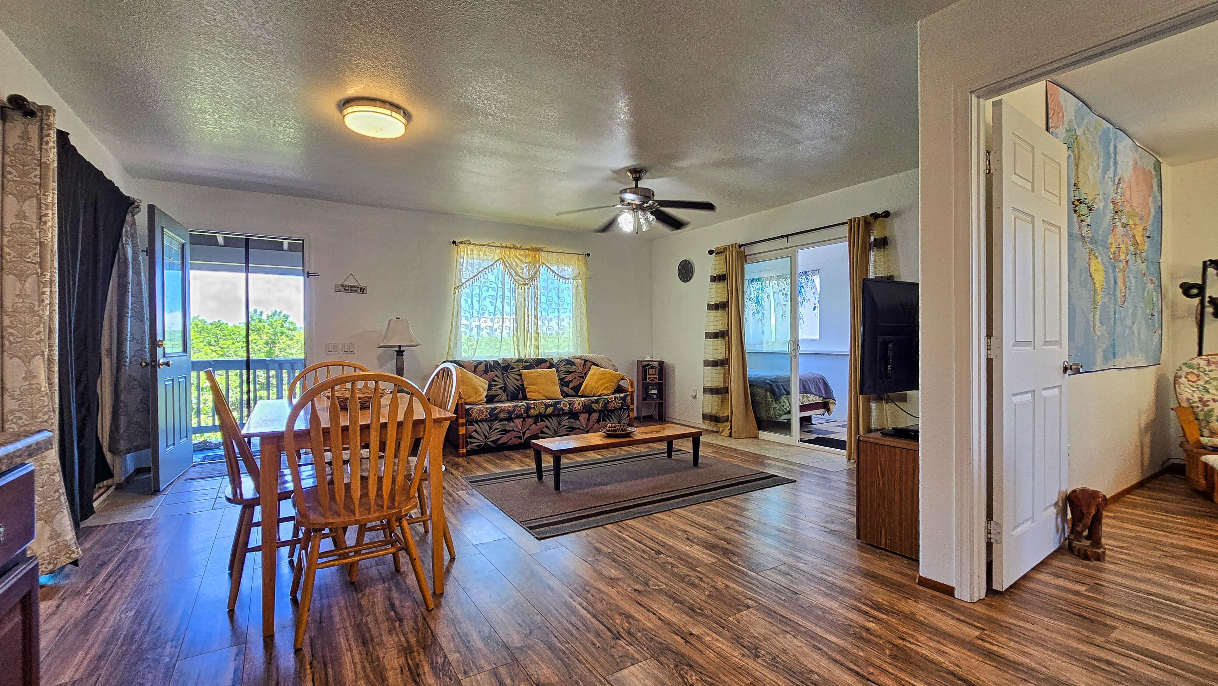 94-1790 Amepela Road Naalehu, HI 96772 - Photo 25 of 30 a living room with furniture and a wooden floor