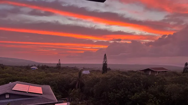 a view of a city and sunset