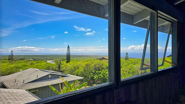 a view of a balcony with an outdoor space