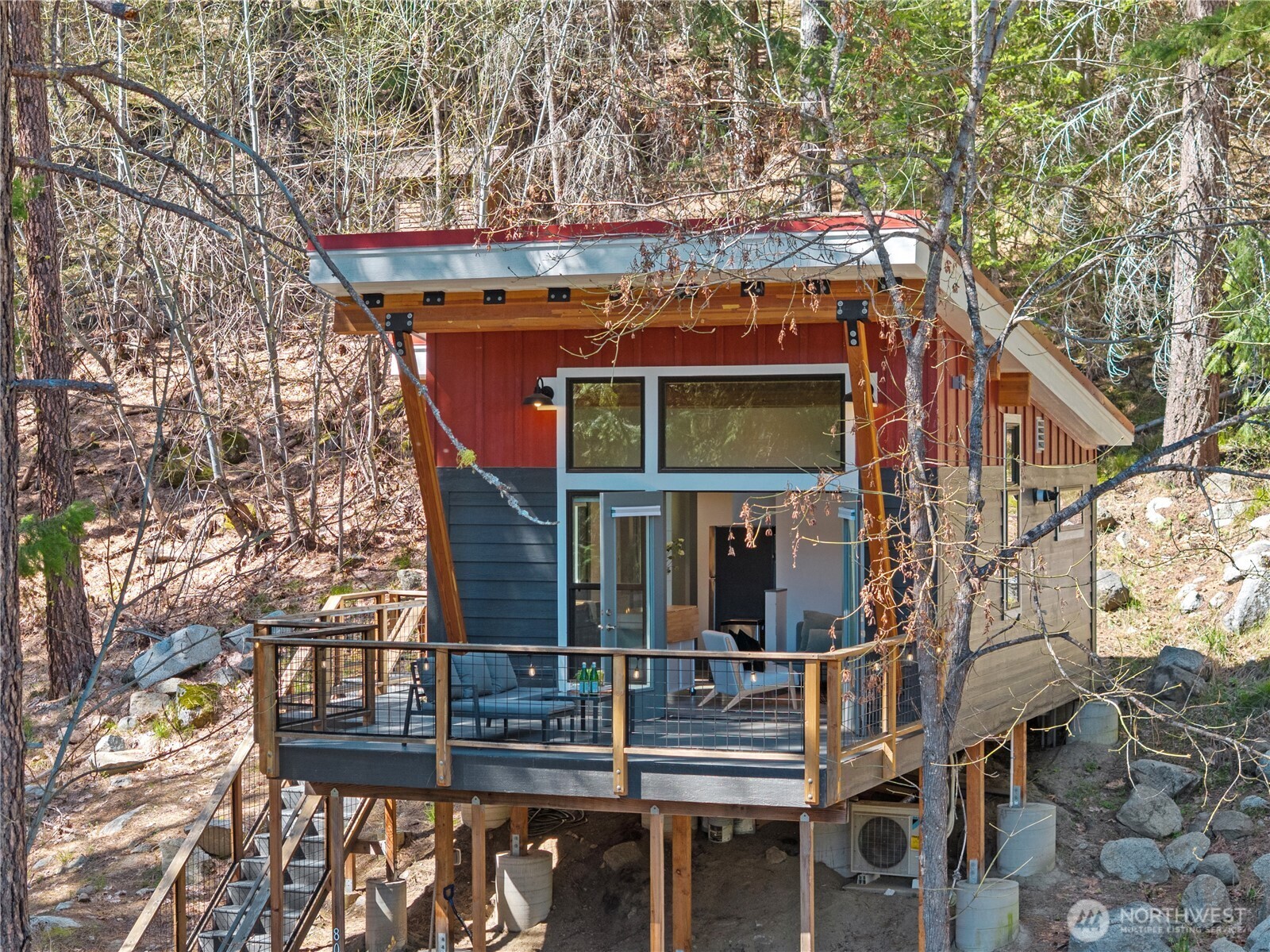 a view of house with outdoor seating