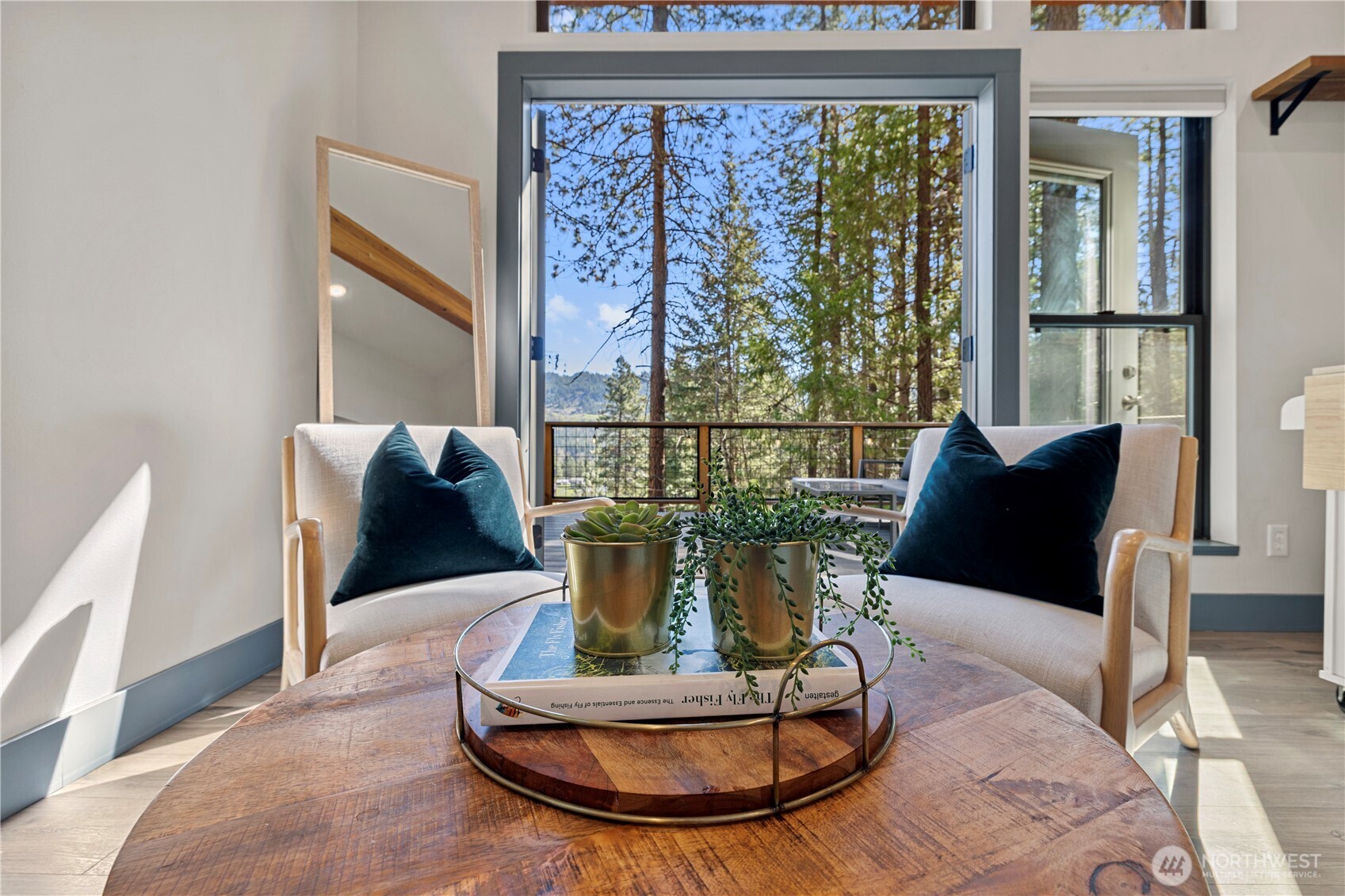 8056 Bayne Road Leavenworth, WA 98826 - Photo 14 of 40 a view of a dining room with furniture window and outside view