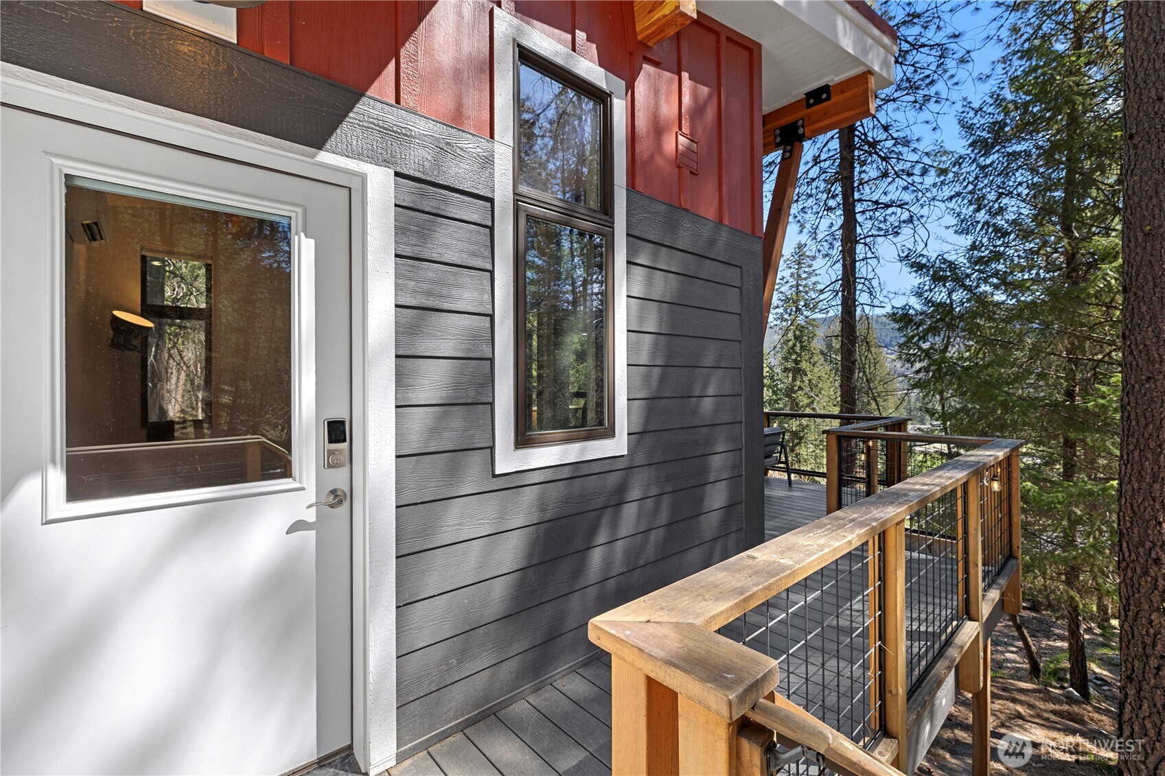 8056 Bayne Road Leavenworth, WA 98826 - Photo 3 of 40 a view of balcony with two chairs and a table