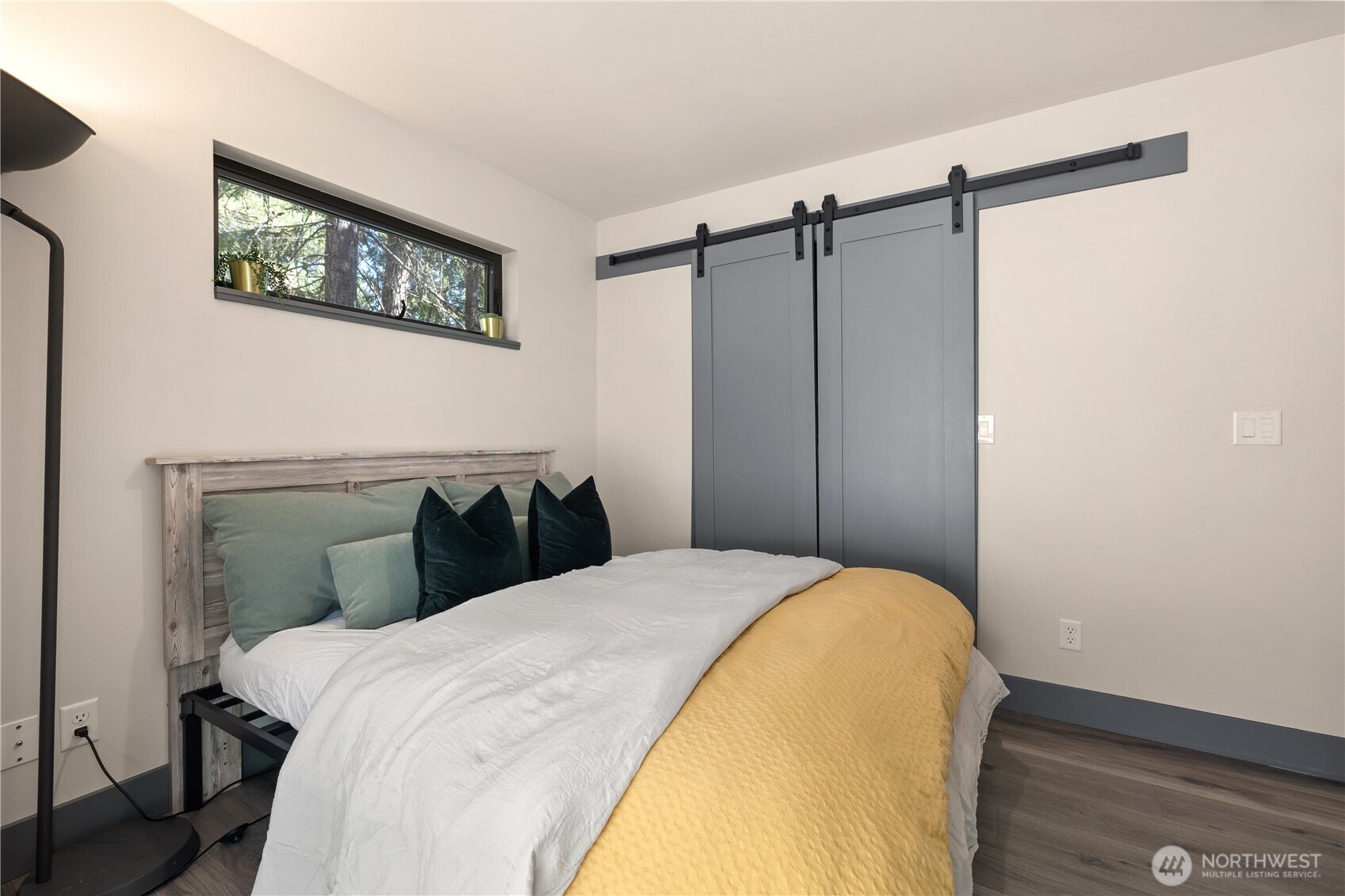 8056 Bayne Road Leavenworth, WA 98826 - Photo 35 of 40 a bed room with a bed and a closet