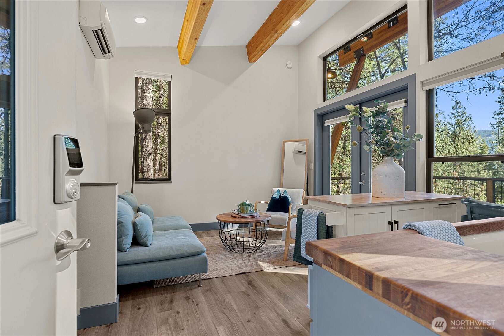 8056 Bayne Road Leavenworth, WA 98826 - Photo 4 of 40 a living room with furniture and a large window