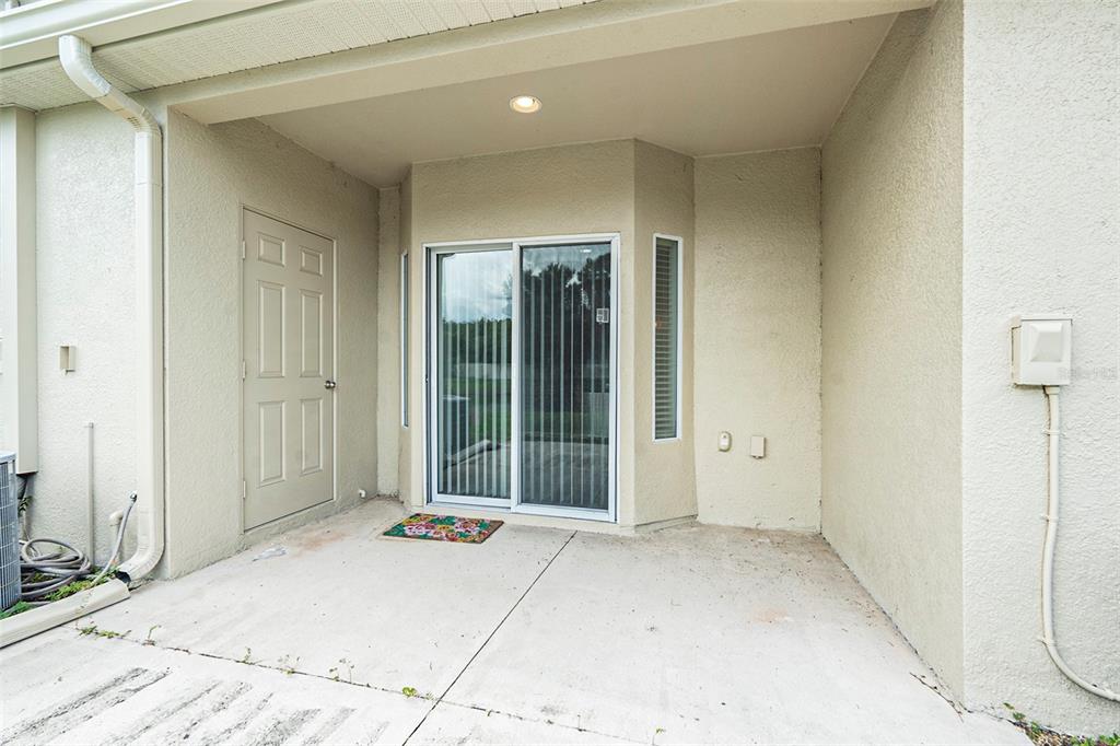 15854 Stable Run Drive Spring Hill, FL 34610 - Photo 26 of 28 a view of a room with a patio