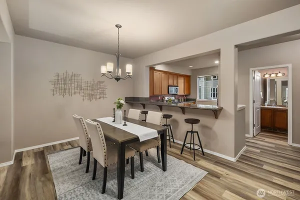 a view of a dining room with furniture