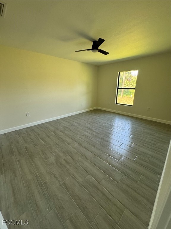 6108 Holt Court Fort Myers, FL 33905 - Photo 14 of 19 an empty room with a empty space and a window