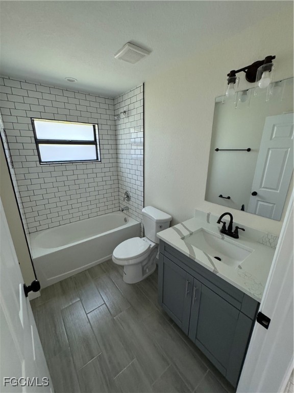 6108 Holt Court Fort Myers, FL 33905 - Photo 16 of 19 a bathroom with a double vanity sink toilet and shower