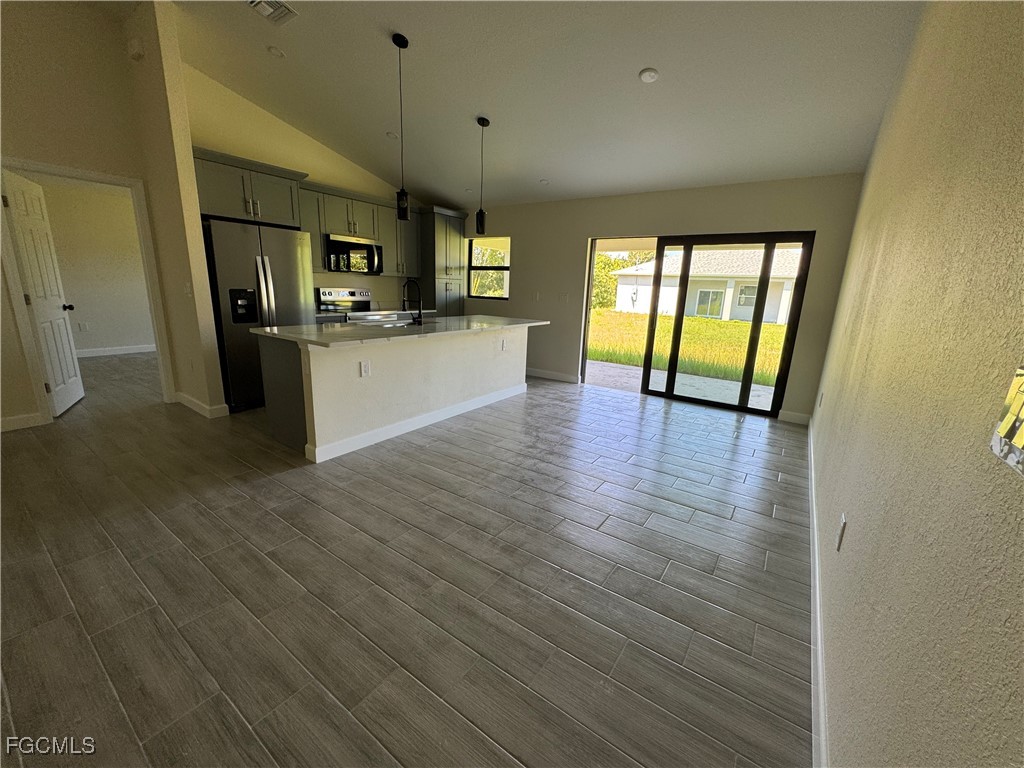 6108 Holt Court Fort Myers, FL 33905 - Photo 5 of 19 a view of a kitchen with furniture and a window