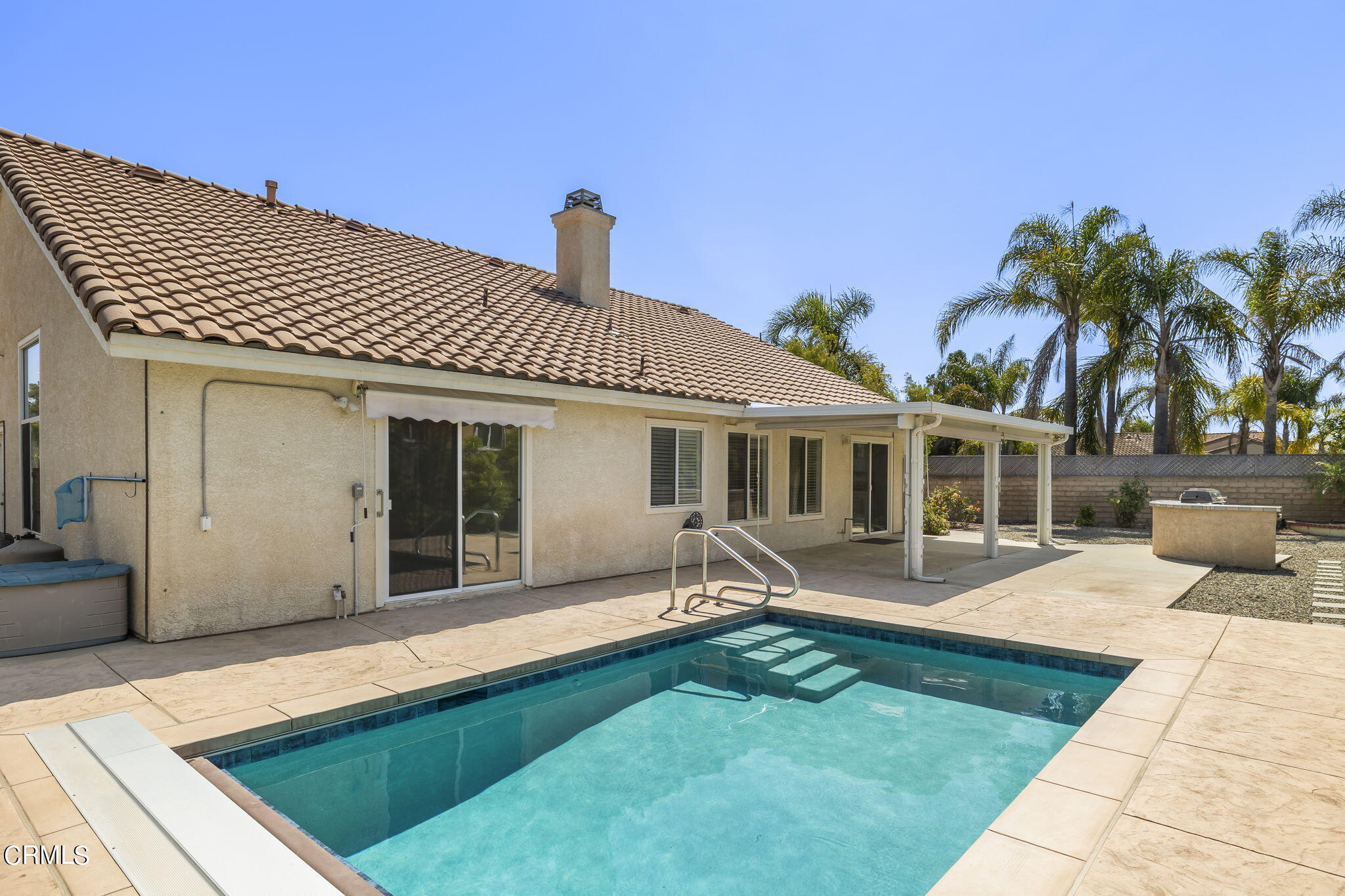 2710 Windcrest Place Oxnard, CA 93036 - Photo 24 of 34 a front view of a house with garden