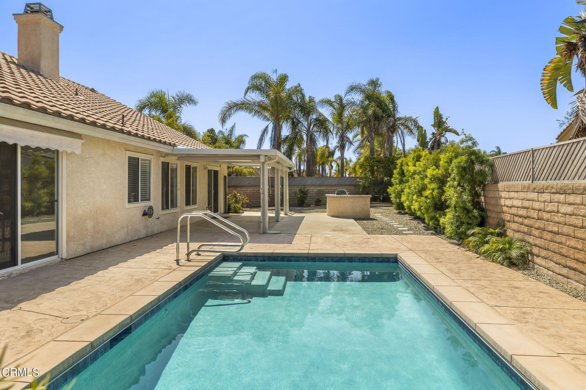 2710 Windcrest Place Oxnard, CA 93036 - Photo 25 of 34 a view of a house with backyard and sitting area