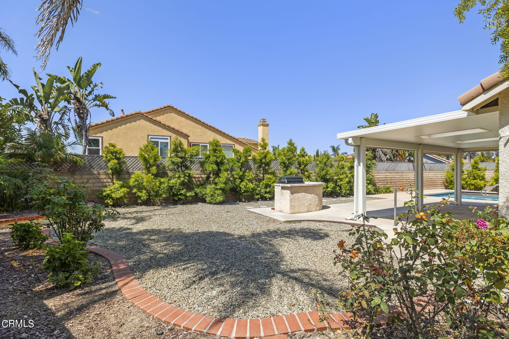 2710 Windcrest Place Oxnard, CA 93036 - Photo 27 of 34 a front view of a house with a yard