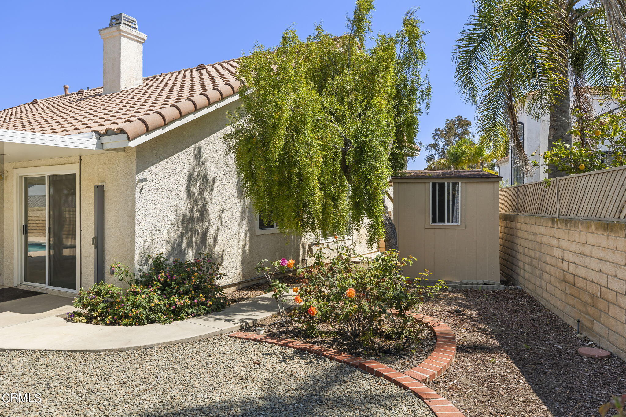 2710 Windcrest Place Oxnard, CA 93036 - Photo 30 of 34 a front view of a house with garden