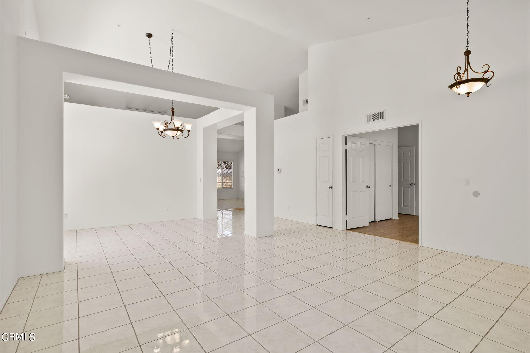 2710 Windcrest Place Oxnard, CA 93036 - Photo 8 of 34 a view of an empty room and chandelier fan