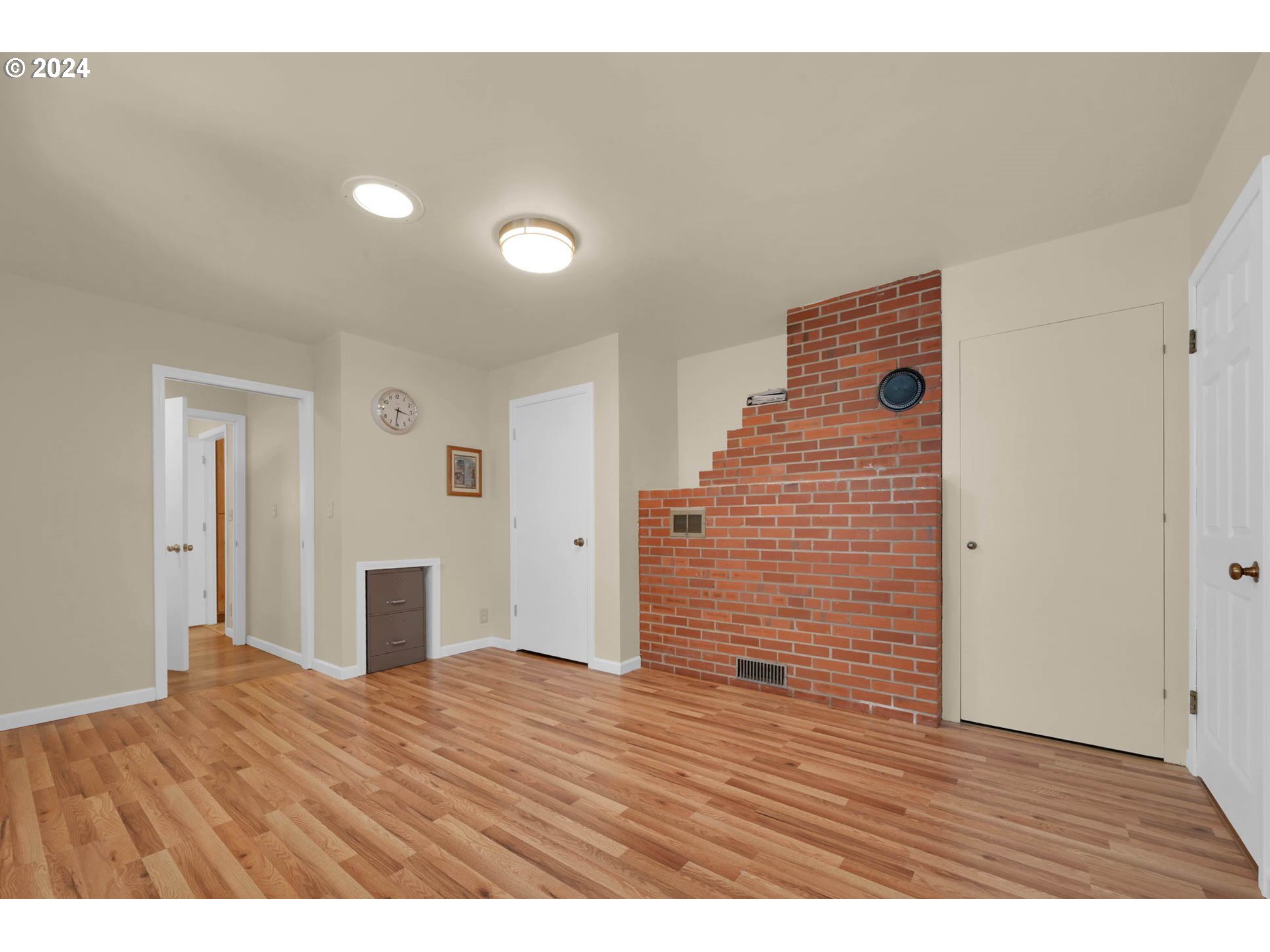 1427 Anderson Lane Springfield, OR 97477 - Photo 23 of 48 a view of an empty room with wooden floor and closet
