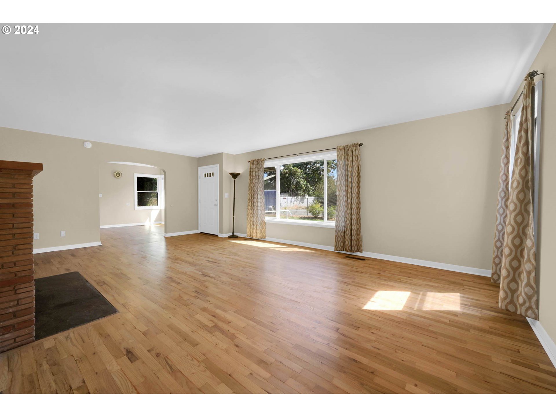 1427 Anderson Lane Springfield, OR 97477 - Photo 8 of 48 a view of empty room with wooden floor and fan