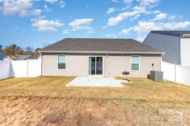 a house with yard in front of it