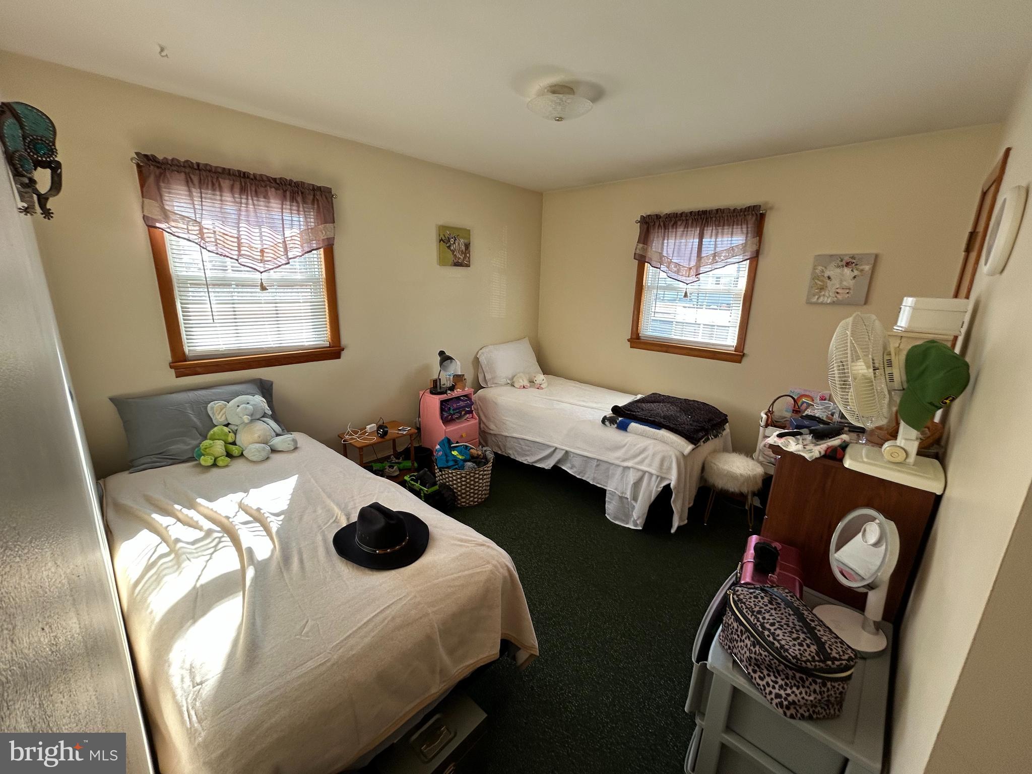 144 Annapolis Road Pennsville, NJ 08070 - Photo 11 of 24 a bedroom with bed and a a mirror