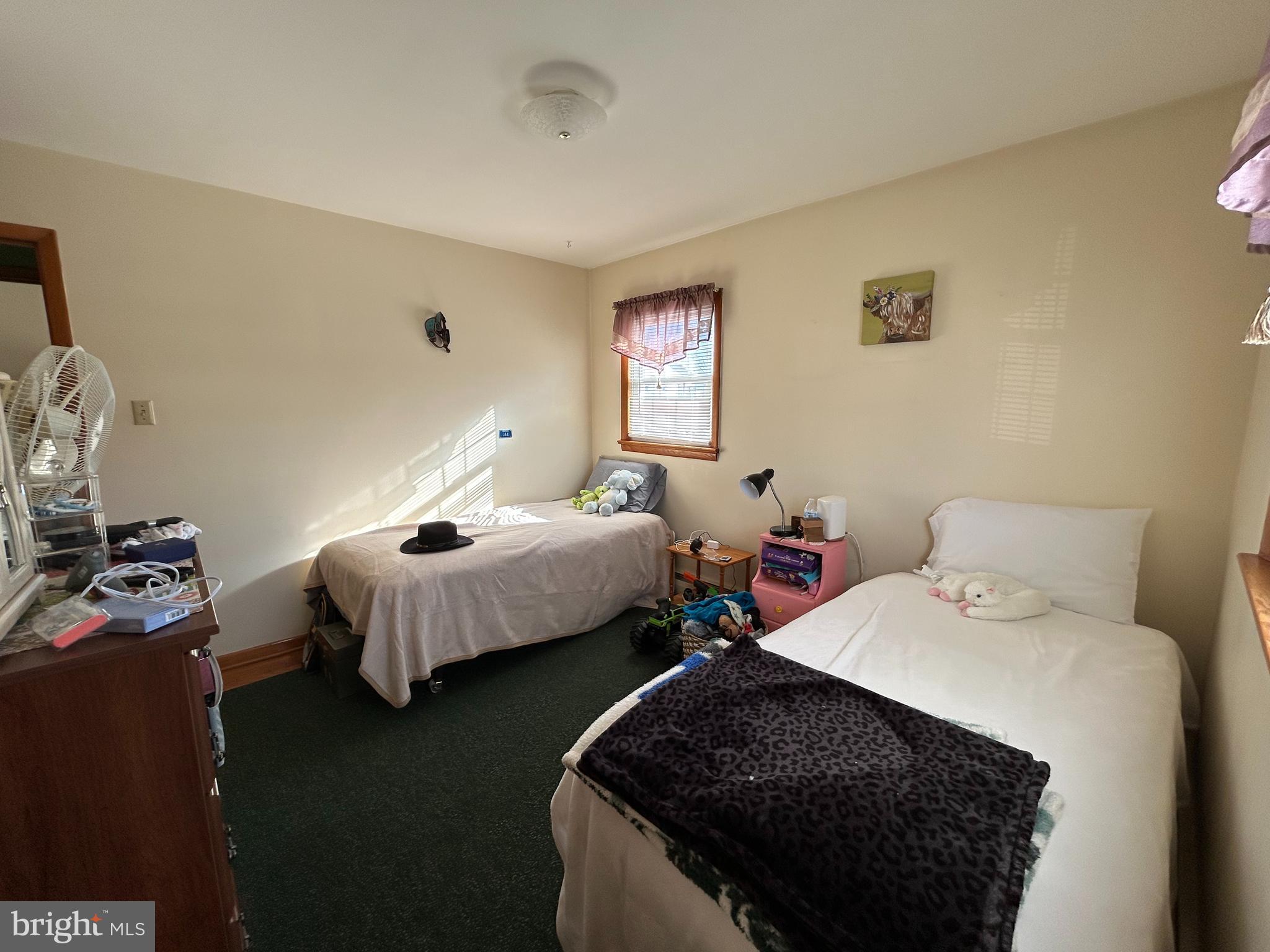 144 Annapolis Road Pennsville, NJ 08070 - Photo 12 of 24 a bedroom with two beds and a dresser