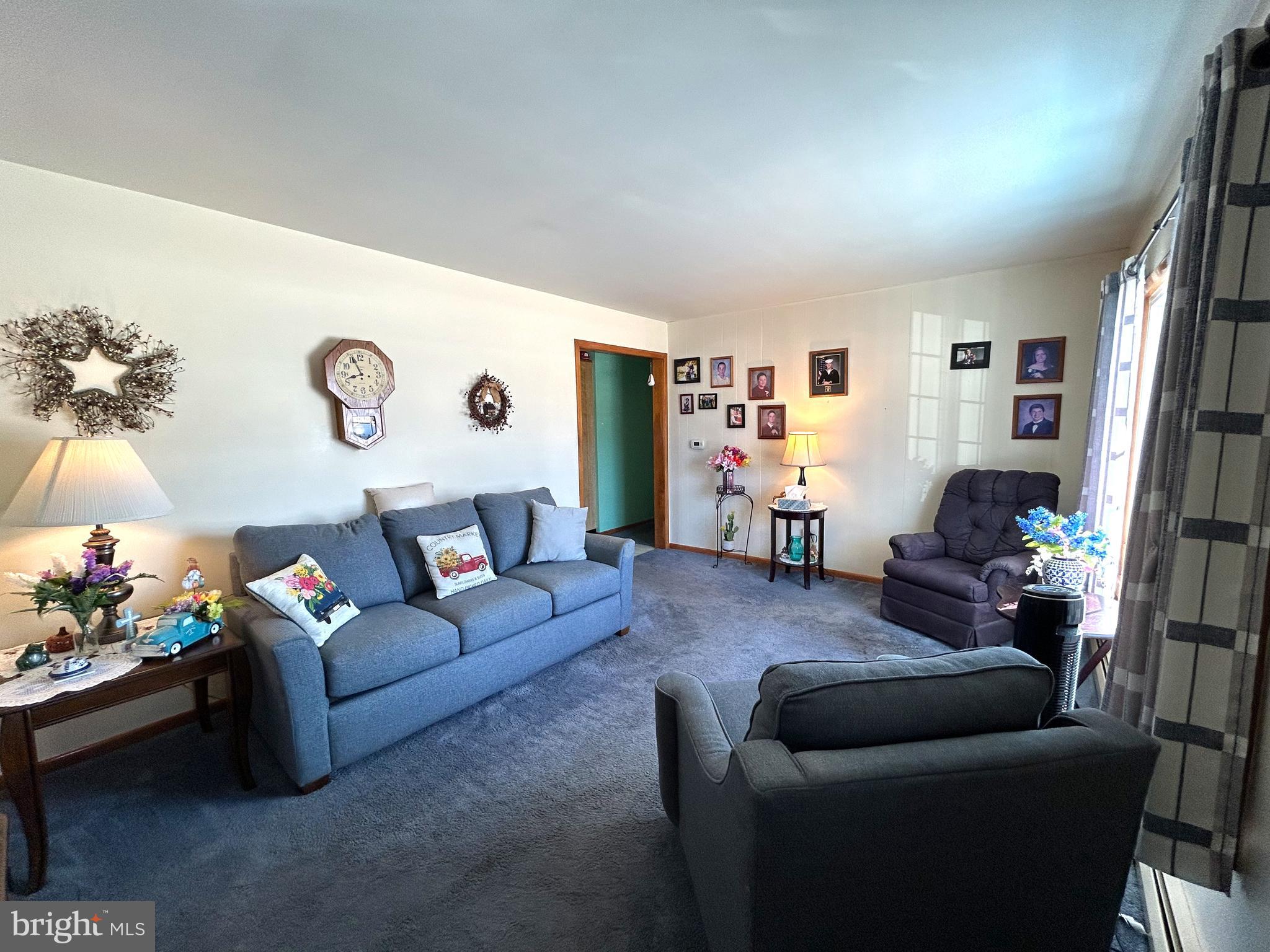 144 Annapolis Road Pennsville, NJ 08070 - Photo 2 of 24 a living room with furniture and a flat screen tv