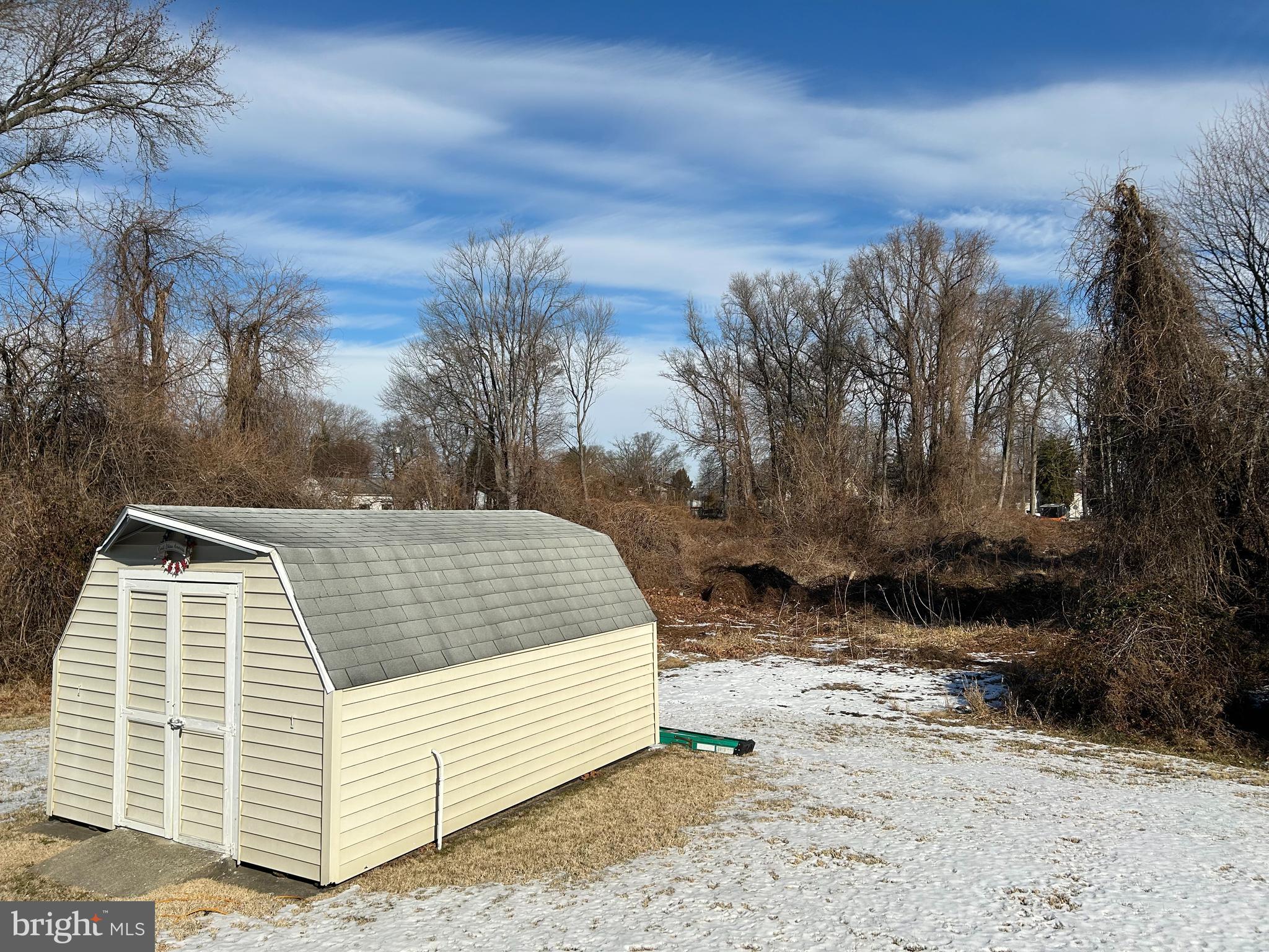 144 Annapolis Road Pennsville, NJ 08070 - Photo 23 of 24 a view of a yard with large trees
