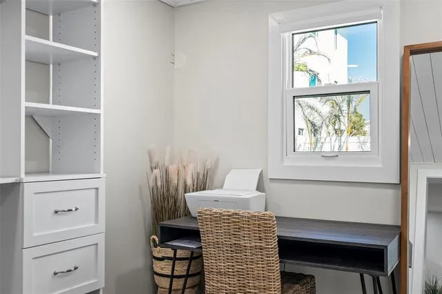 a bathroom with a sink a toilet and a shower