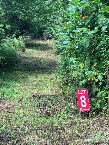 a view of a sign board in a yard
