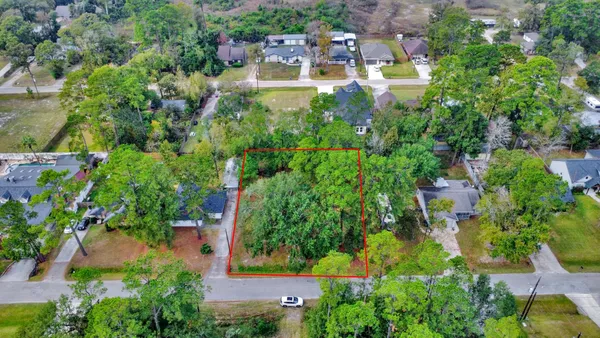 an aerial view of residential house with swimming pool and outdoor space