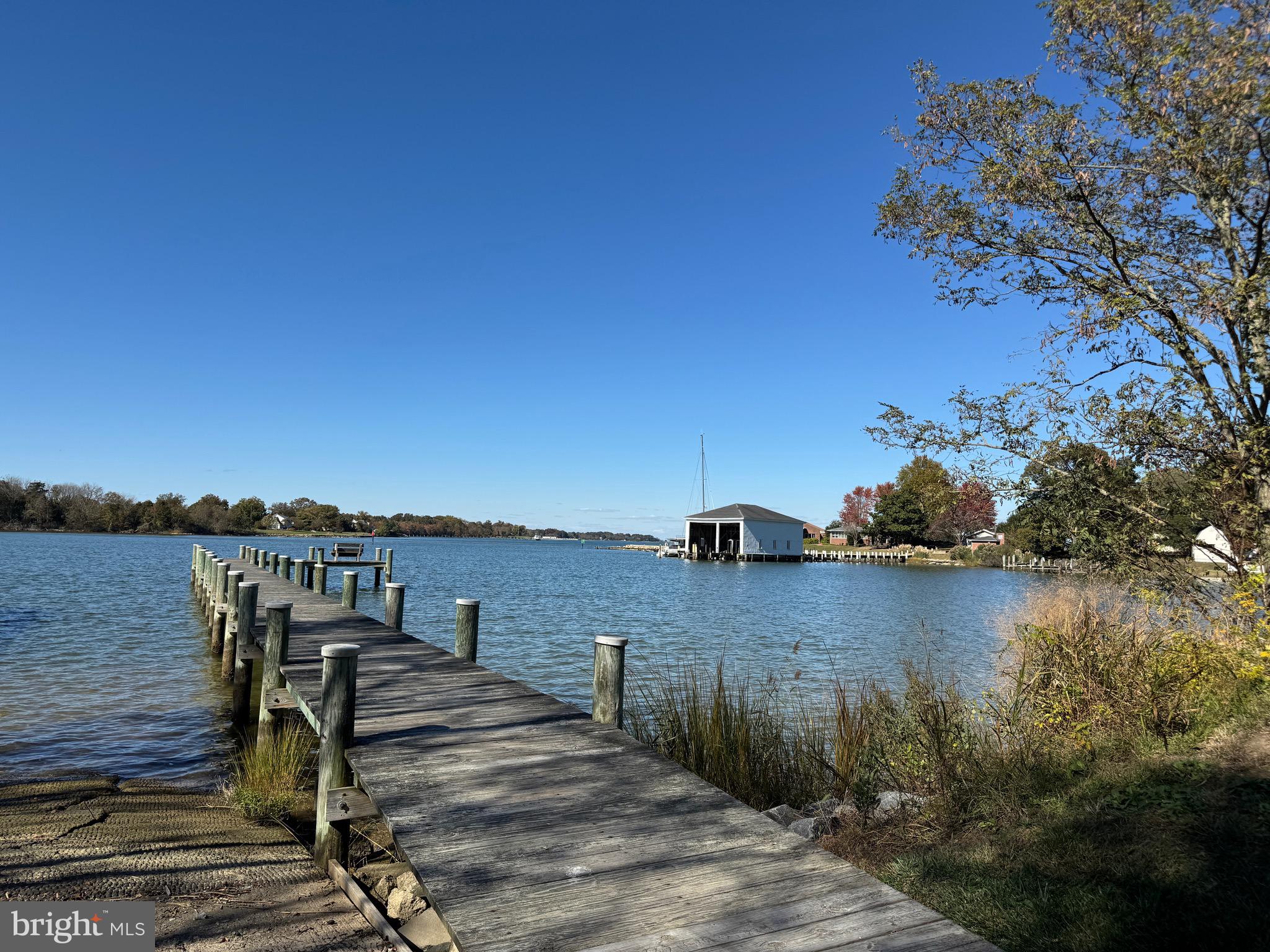 101 Albemarle Court Cambridge, MD 21613 - Photo 2 of 47 a view of a lake with sitting area