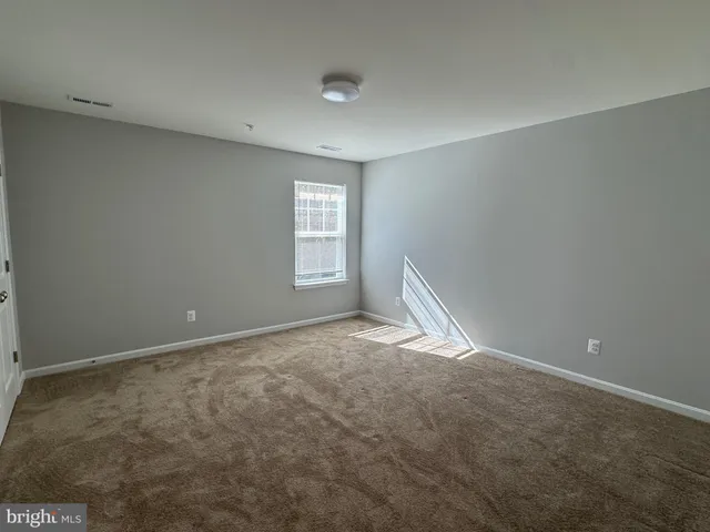 a view of empty room with window