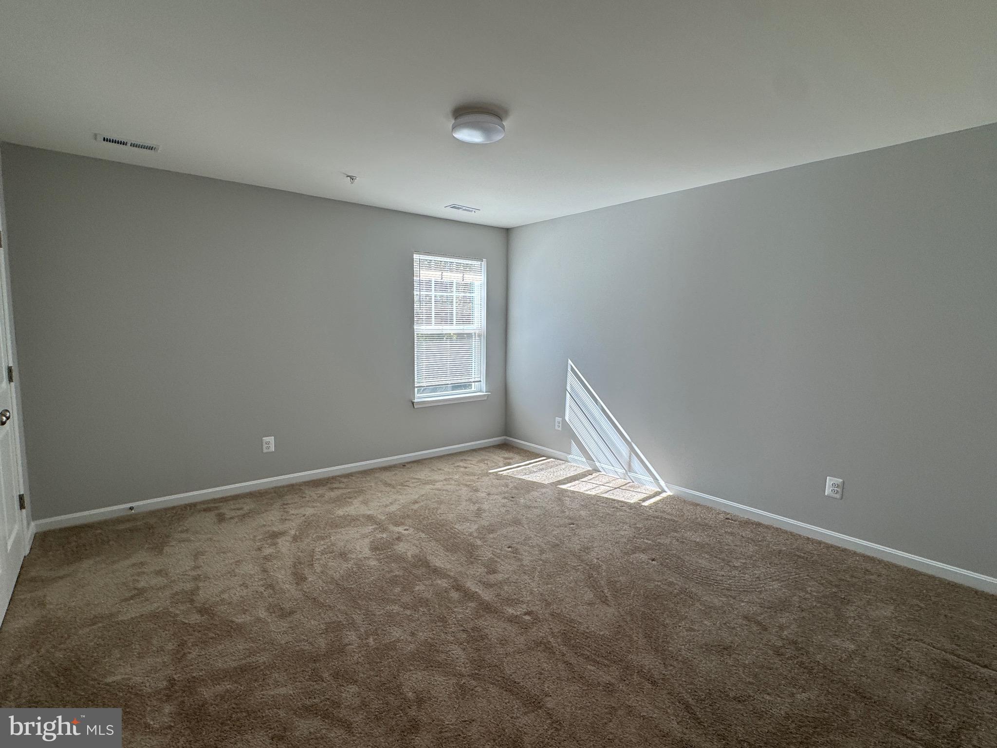 101 Albemarle Court Cambridge, MD 21613 - Photo 23 of 47 a view of empty room with window