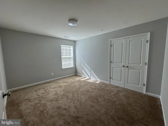 a view of empty room with window