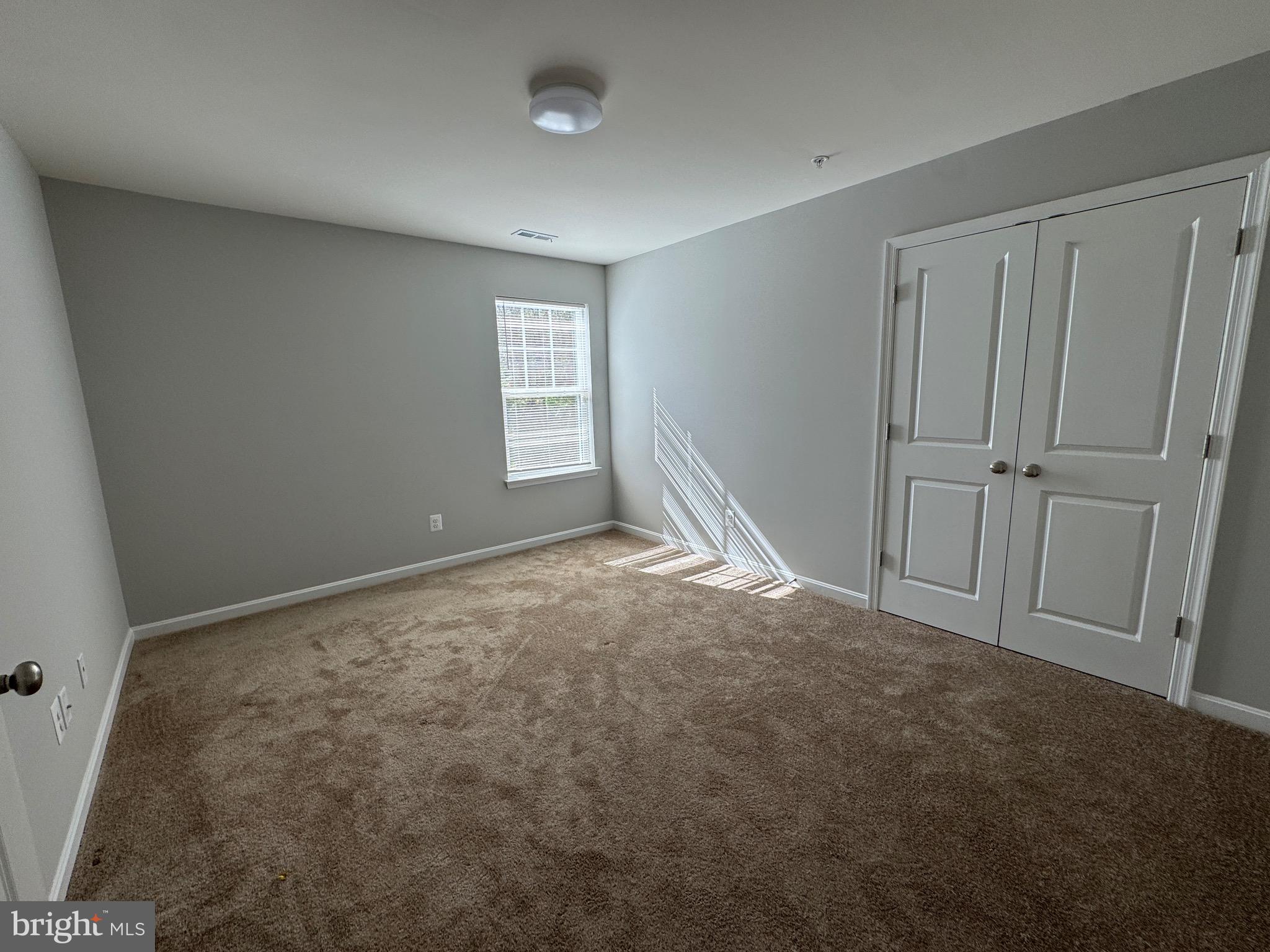 101 Albemarle Court Cambridge, MD 21613 - Photo 27 of 47 a view of empty room with window