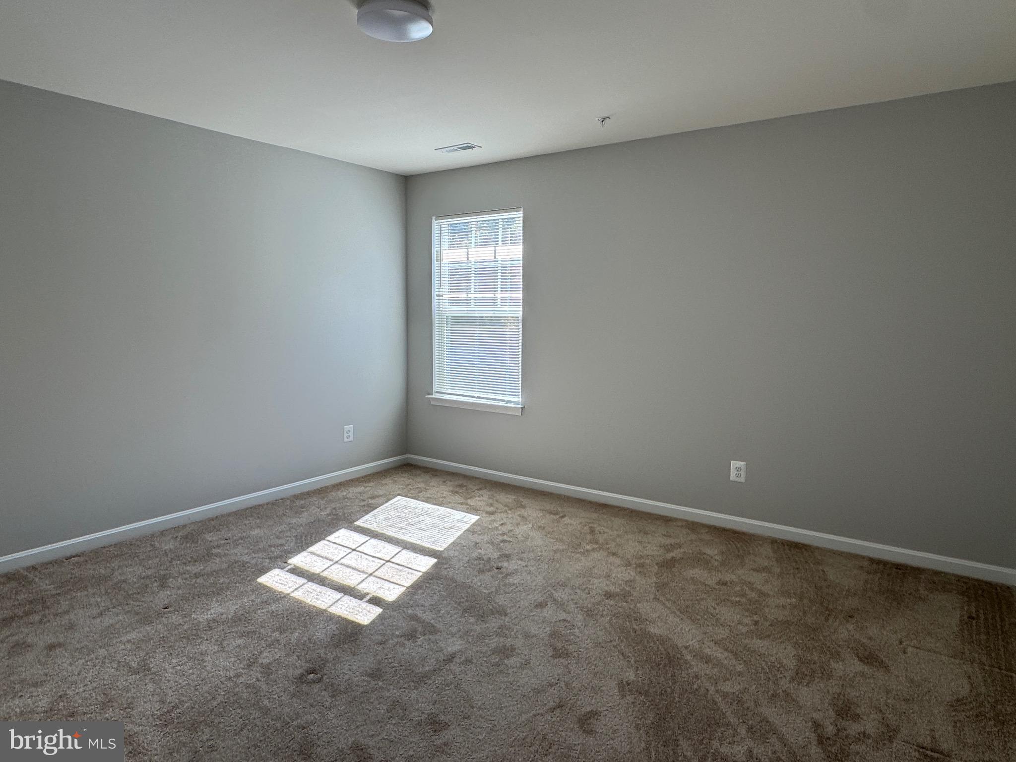 101 Albemarle Court Cambridge, MD 21613 - Photo 30 of 47 an empty room with windows