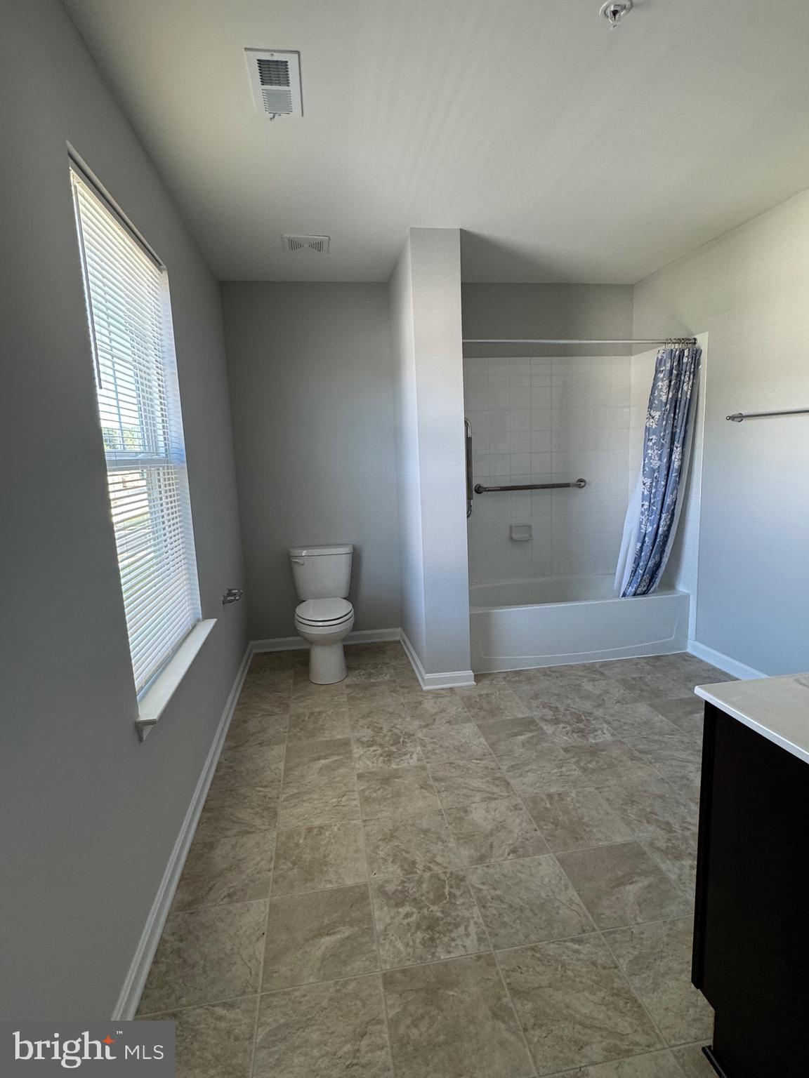101 Albemarle Court Cambridge, MD 21613 - Photo 37 of 47 a view of a room with a fireplace and a window