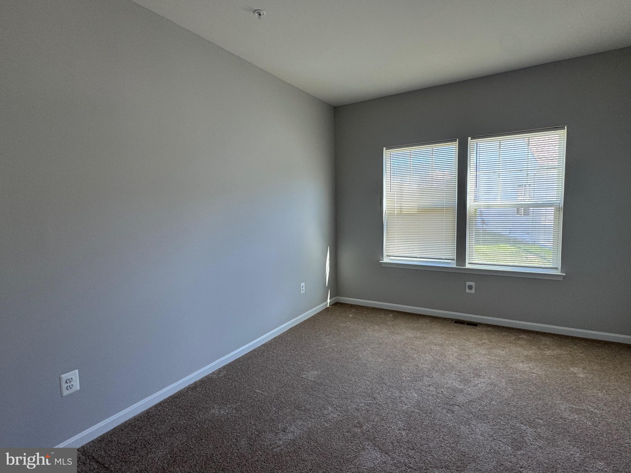 101 Albemarle Court Cambridge, MD 21613 - Photo 46 of 47 an empty room with a window