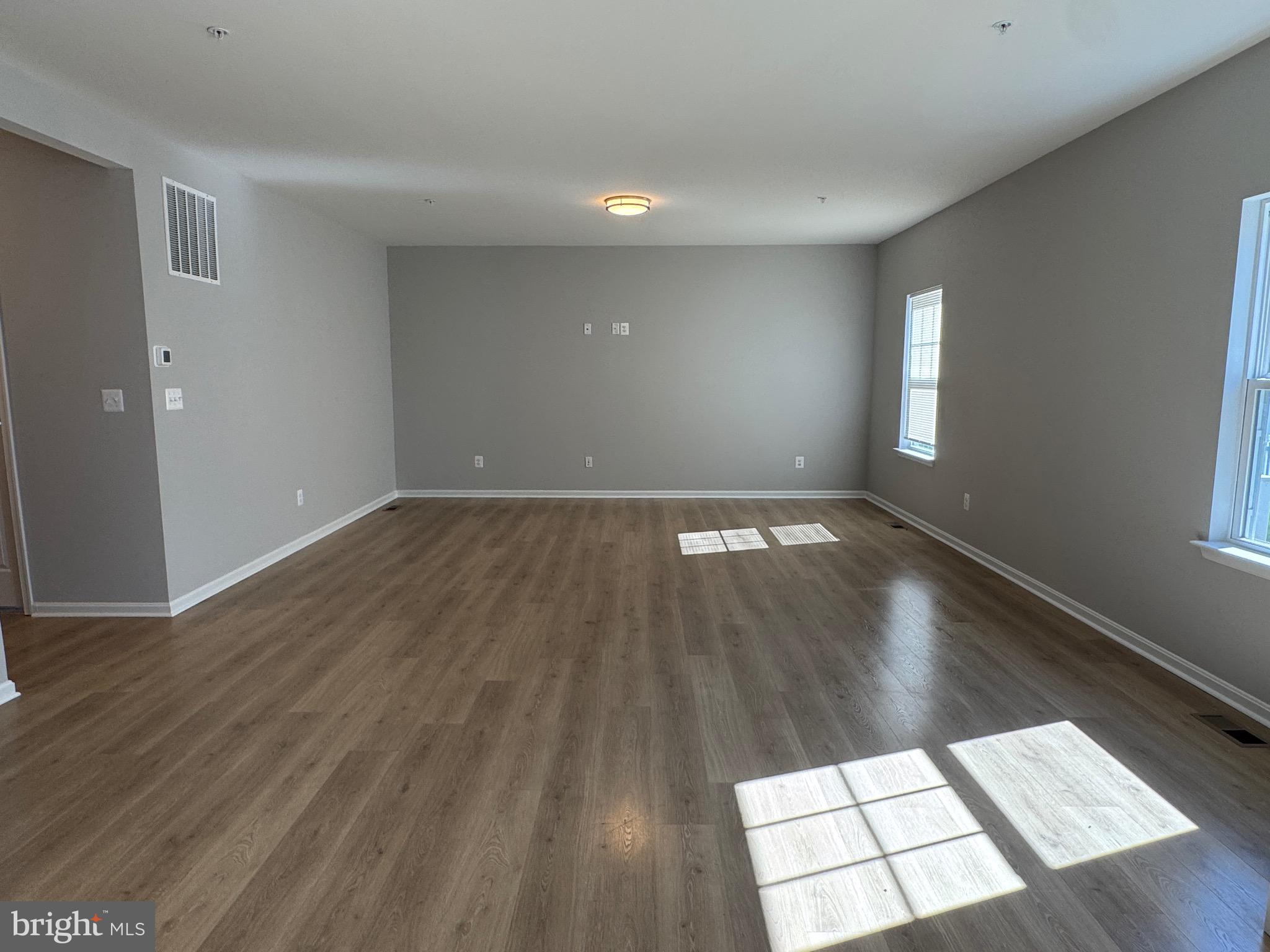 101 Albemarle Court Cambridge, MD 21613 - Photo 8 of 47 a view of an empty room and window