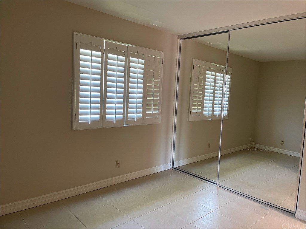 15 Robinsong, Unit 160 Irvine, CA 92614 - Photo 19 of 31 Mirrored wardrobes in 2nd bedroom