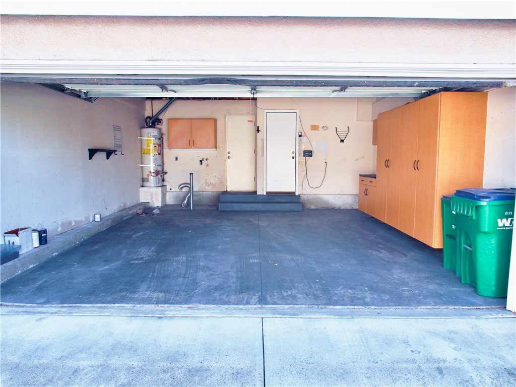 15 Robinsong, Unit 160 Irvine, CA 92614 - Photo 25 of 31 Two car garage with added storage, garage door opener and direct access to the home and back patio