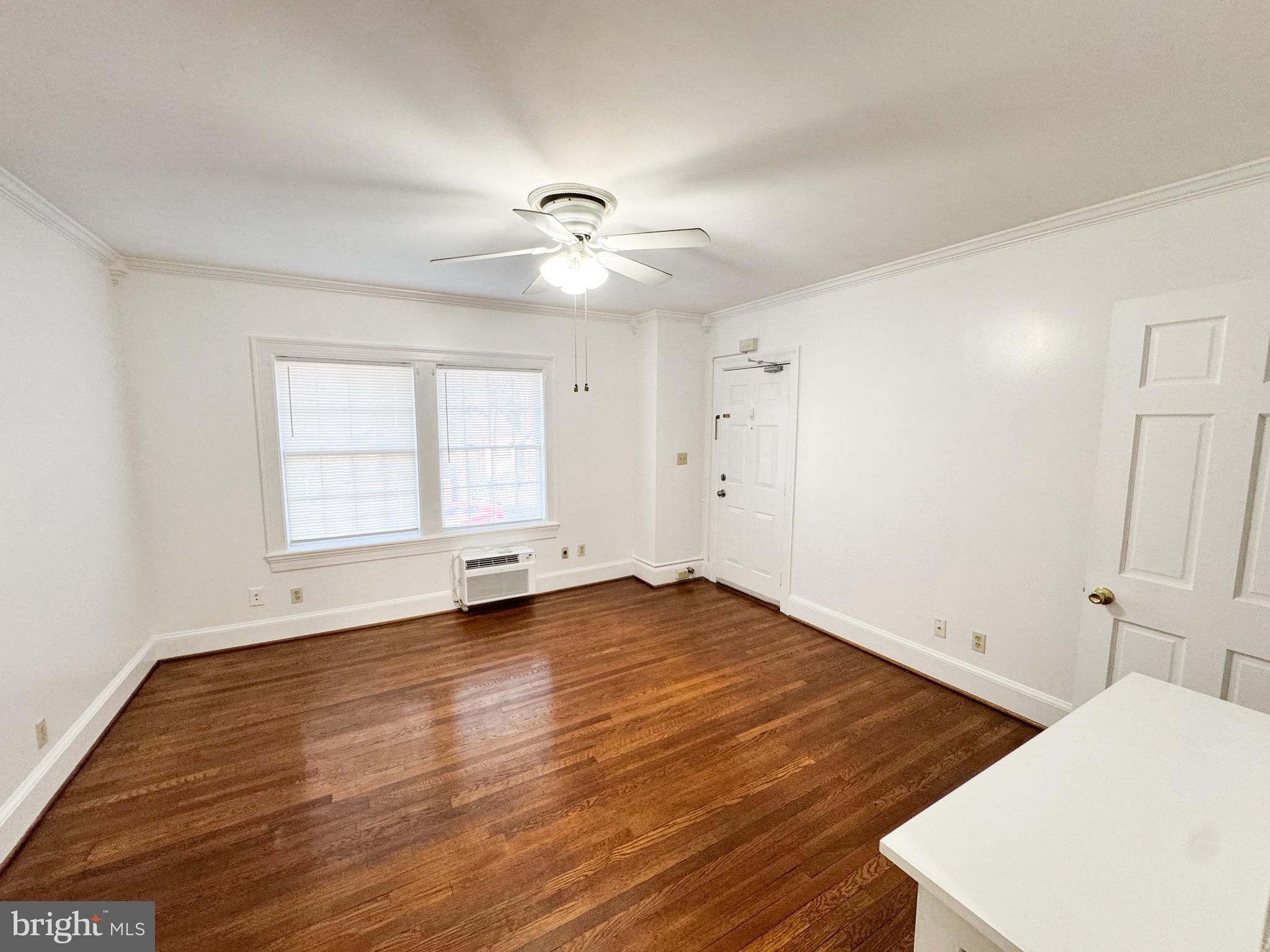 4348 Ellicott Street Northwest, Unit 3 Washington, DC 20016 - Photo 3 of 16 a view of an empty room with a window
