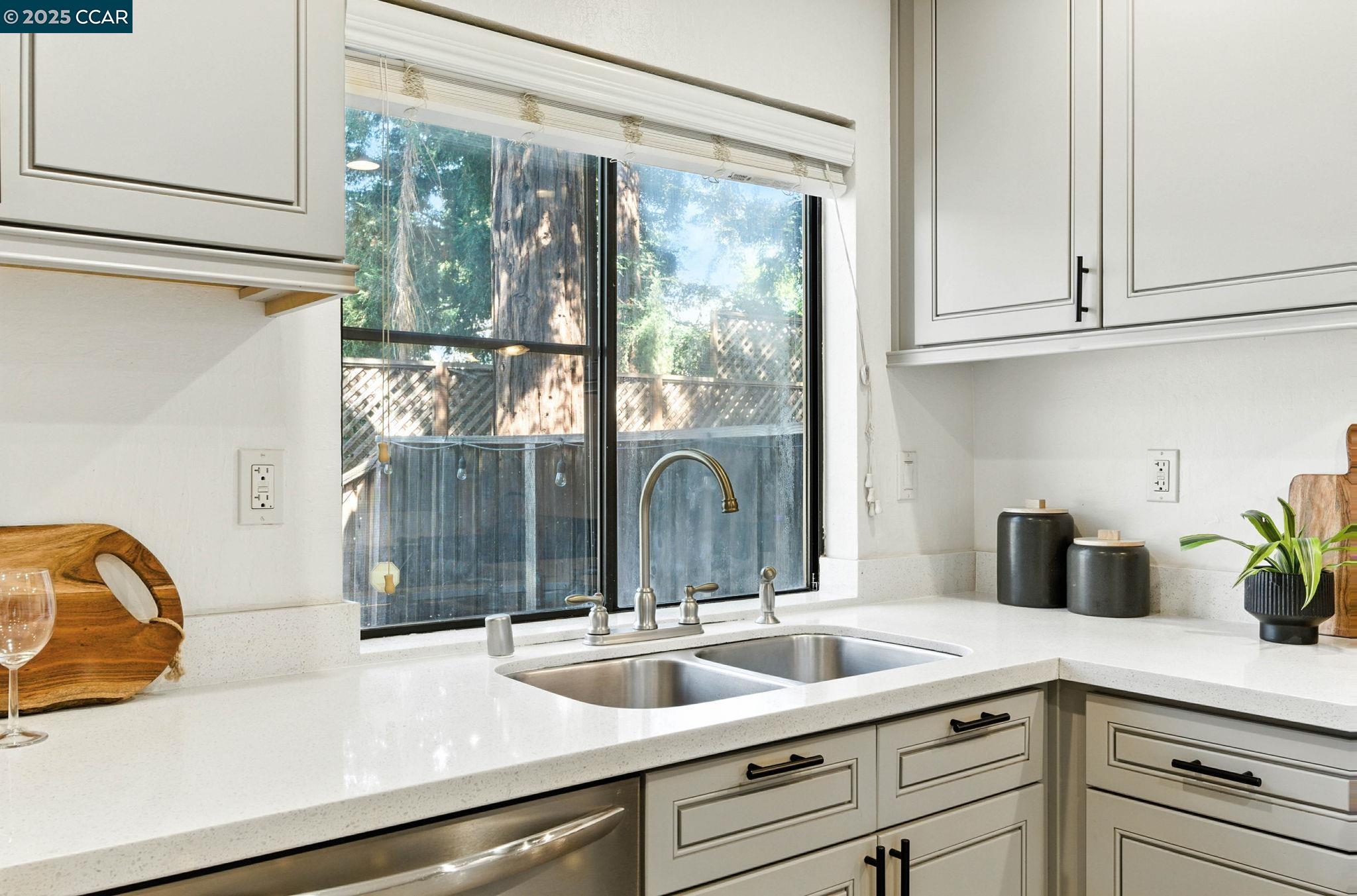 1660 San Luis Road Walnut Creek, CA 94597 - Photo 12 of 46 a kitchen with a sink and a window